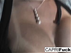 Capri Cavanni play with her moist puss