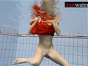 cool torrid girl swimming in the pool